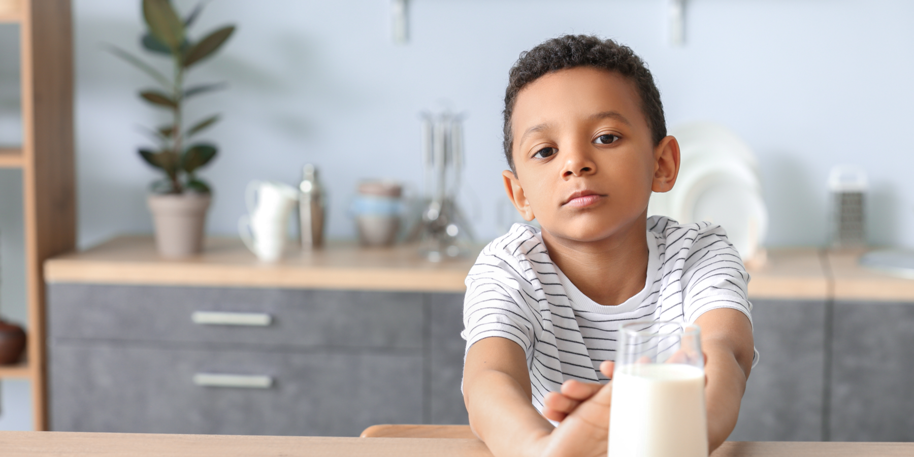 Kid saying no to milk